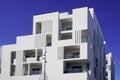 Design facade white modern building in a new district in a blue sky Royalty Free Stock Photo