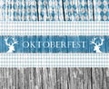 Oktoberfest design over wooden background. Design for the famous, traditional bavarian Oktoberfest.