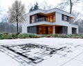Design framework in focus - house model positioned over detailed blueprints, emphasizing architectural structure