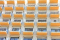 Modern European facade of multi-storey apartment building or hotel with many balconies Royalty Free Stock Photo