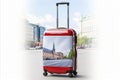 Design a sleek, modern suitcase with sturdy wheels and a retractable handle