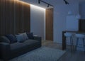 Design a small room with a sofa. Night. Evening lighting. Royalty Free Stock Photo