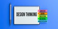 Design Thinking text message on notebook.