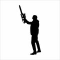 silhouette of a man with a chainsaw, on a white background Royalty Free Stock Photo