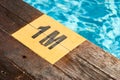 Designation of the swimming pool depth Royalty Free Stock Photo