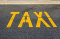 Designation of the taxi rank on the yellow paint asphalt