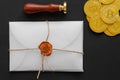 The designed envelope with a golden stamp is used for sending golden bitcoin coins as a gift. There are big golden BTC