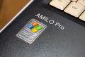 Designed for Microsoft Windows XP, Amilo Pro laptop, old netbook outdated operating system sticker, retro computing concept Royalty Free Stock Photo