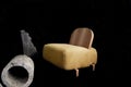 designer armchair yellow wall, back in wood and yellow textile