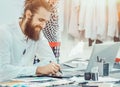 Designer with a beard is working on  new collection Royalty Free Stock Photo