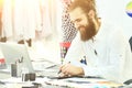 Designer with a beard is working on new collection Royalty Free Stock Photo