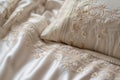 designer bedspread adorned with elegant embroidery closeup Royalty Free Stock Photo