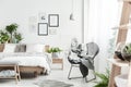 Designer chair in natural bedroom Royalty Free Stock Photo