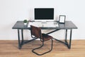 Designer desk with brown chair Royalty Free Stock Photo