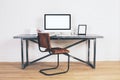 Designer desk with empty screen