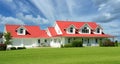 Modern Designer Farmhouse Residence Dream Home Exterior House Grand Dwelling Custom Design Red Metal Roofing Royalty Free Stock Photo