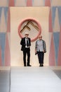 Designer Karl Lagerfeld and Silvia Venturini Fendi acknowledging the applause of the public after the Fendi show