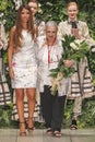 Designer Laura Biagiotti (R) walks runway during the Laura Biagiotti fashion show