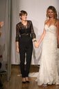 Designer Madeline Gardner and model walk at Mori Lee Bridals Fall/Winter 2016 Runway Show