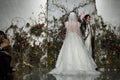 Designer Madeline Gardner and model walk the runway during the Morilee by Madeline Gardner Spring 2020 bridal fashion show