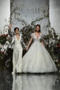 Designer Madeline Gardner and model walk the runway during the Morilee by Madeline Gardner Spring 2020 bridal fashion show