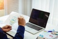 Designer man mobile application test new app features. He working with sketch drawing application and create coding program on Royalty Free Stock Photo