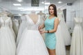 Designer measure dress on a mannequin in bridal shop Royalty Free Stock Photo