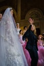 Designer Reem Acra greets the audience after the Reem Acra Bridal Spring 2020 fashion collection
