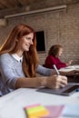 Female web designer working in an office Royalty Free Stock Photo