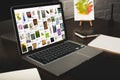 designer workplace with laptop and pinterest website Royalty Free Stock Photo