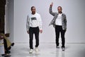 Designers Ariel Ovadia and Shimon Ovadia walk the runway at the Ovadia and Sons Spring 2018 Collection