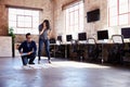 Designers Planning Layout On Floor Of Modern Office Royalty Free Stock Photo