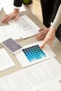 Designers working on house interior with color swatches and layo Royalty Free Stock Photo