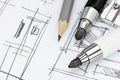 Designers working tools on graphical sketch of modern room inter