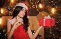 Desirable Santa girl. Gift for adults. Woman with present box. Happy new year. Merry christmas. Erotic surprise. Sexual