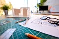 Desk In Architects Office With Plans Drawing Instruments And Model Royalty Free Stock Photo