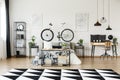 Desk and bicycle in bedroom