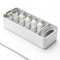 Desk cable organizer on white background Royalty Free Stock Photo