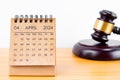 Desk calendar for April 2024 and judge\'s gavel