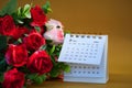 Desk calendar for February 2024 on a gold background Royalty Free Stock Photo