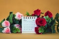 Desk calendar for February 2024 on a gold background Royalty Free Stock Photo