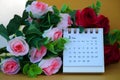 Desk calendar for February 2024 on a gold background Royalty Free Stock Photo