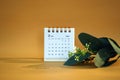 Desk calendar for February 2024 on a gold background Royalty Free Stock Photo