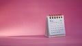 Desk calendar for February 2024 on a pink background Royalty Free Stock Photo