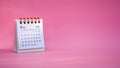 Desk calendar for February 2024 on a pink background Royalty Free Stock Photo