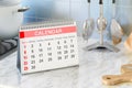 Desk Calendar on the kitchen table. 3D rendering Royalty Free Stock Photo