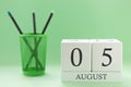 Desk calendar of two cubes for August 5 Royalty Free Stock Photo