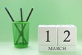 Desk calendar of two cubes for March 12 Royalty Free Stock Photo