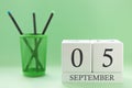 Desk calendar of two cubes for September 5 Royalty Free Stock Photo