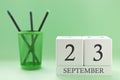 Desk calendar of two cubes for September 23 Royalty Free Stock Photo